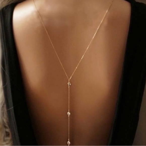 REVOLVE Jewelry - 🆕Gold sexy back necklace body chain
